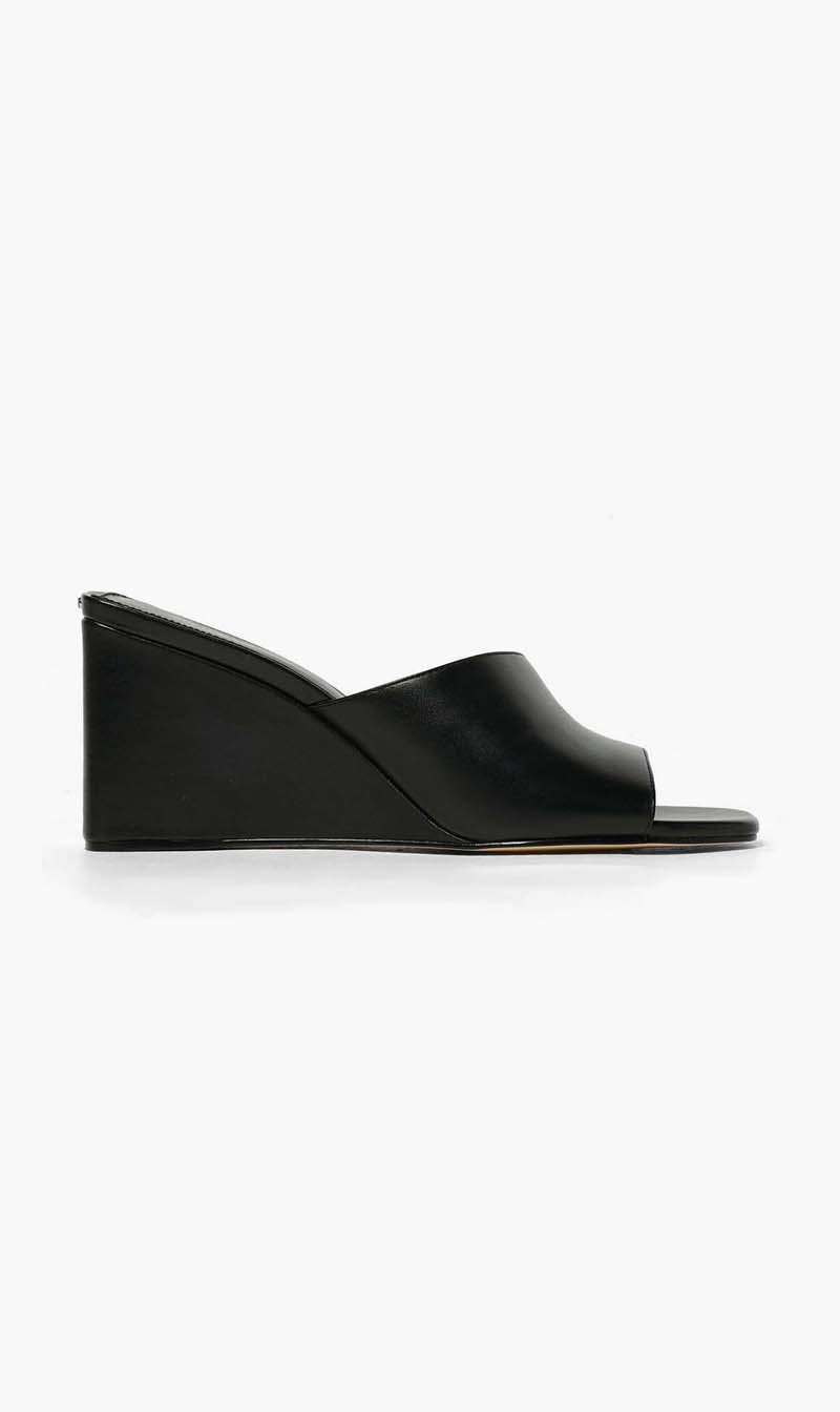 Michael Kors Black Merriam Wedge Sandal for Women
Michael Kors Black Merriam Wedge Sandal for Women