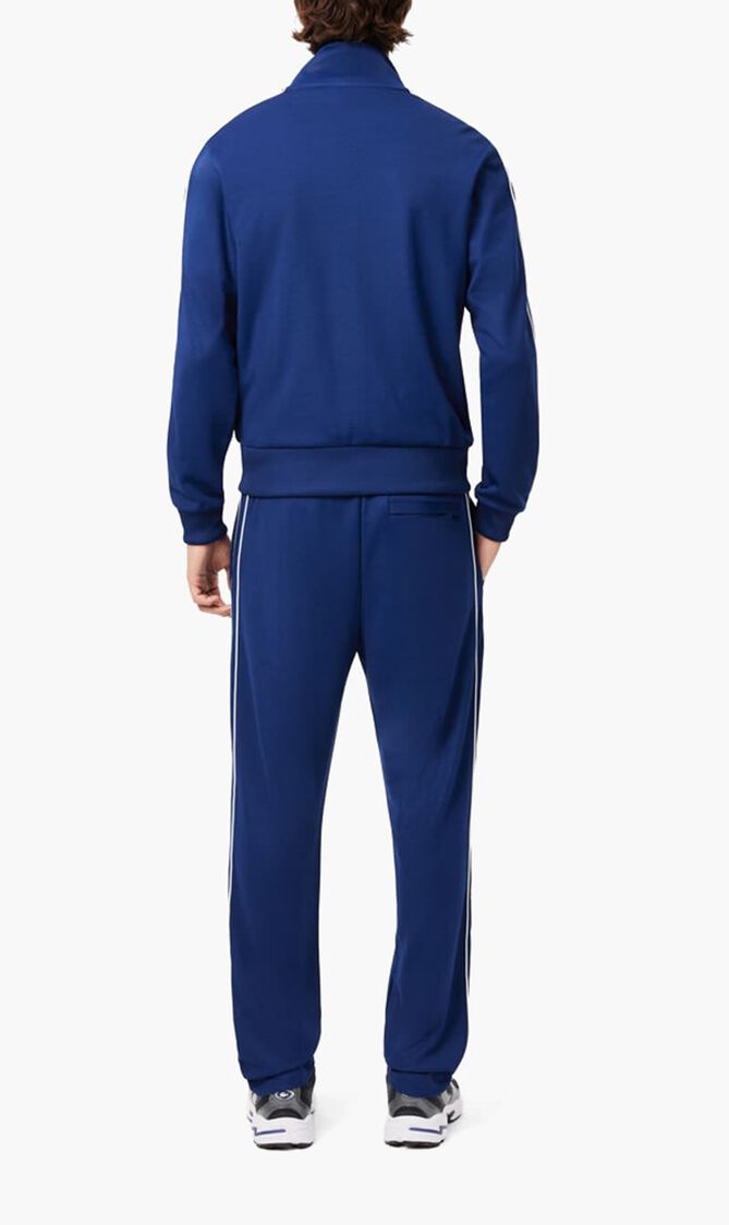 TRACKSUITS & TRACK TROUS.