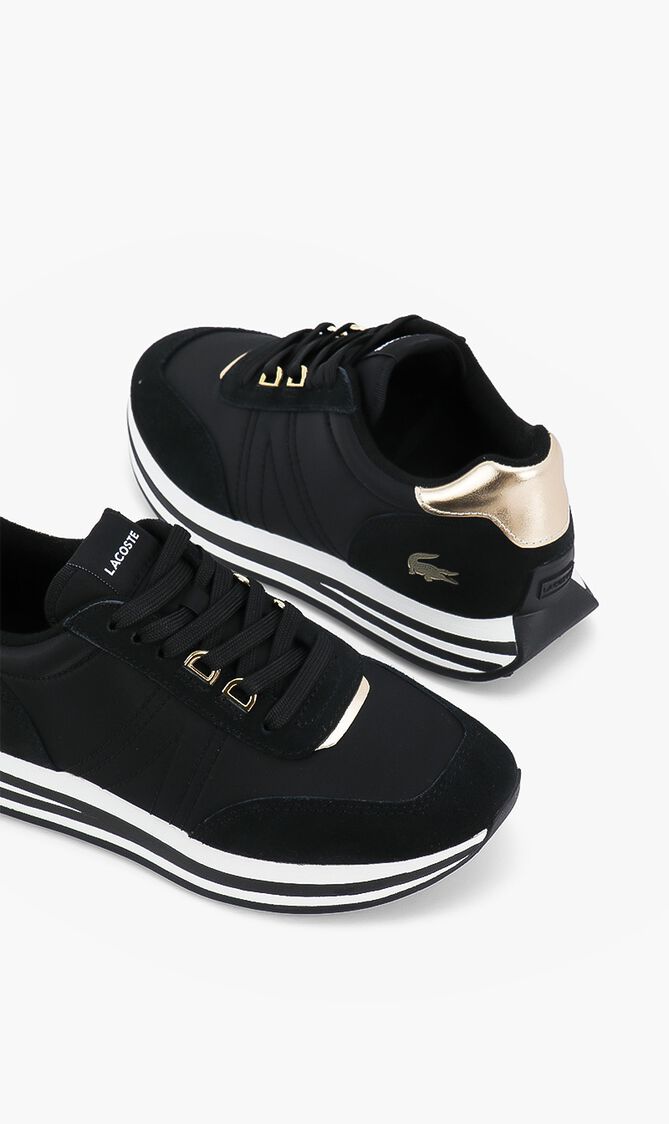 L Spin Sneakers