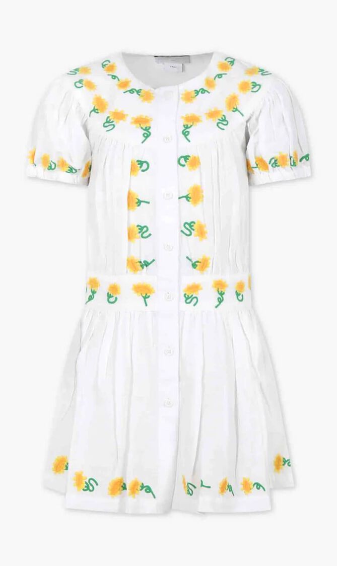 White dress for girl with embroidered sunflowers