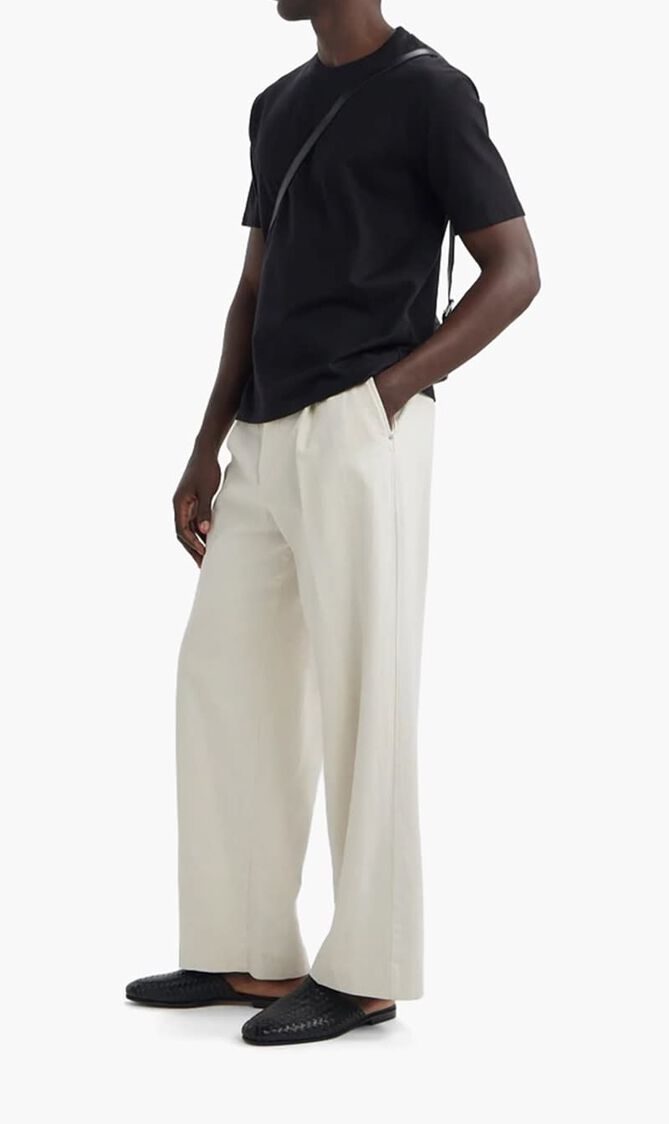 Woven leather slippers