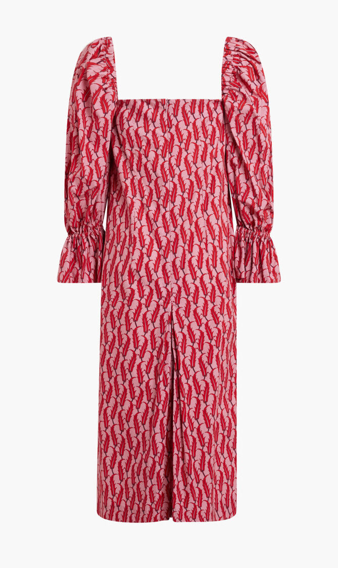 LONG RED DRESS WITH DARK RED FEATHER MOTIF. PUFFED MID-LENGHT SLEEVES AND SQUARE COLLAR.