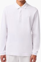 قميص بولو من نسيج مرن ذو قصة كلاسيكية وأكمام طويلة قميص بولو من نسيج مرن ذو قصة كلاسيكية وأكمام طويلة