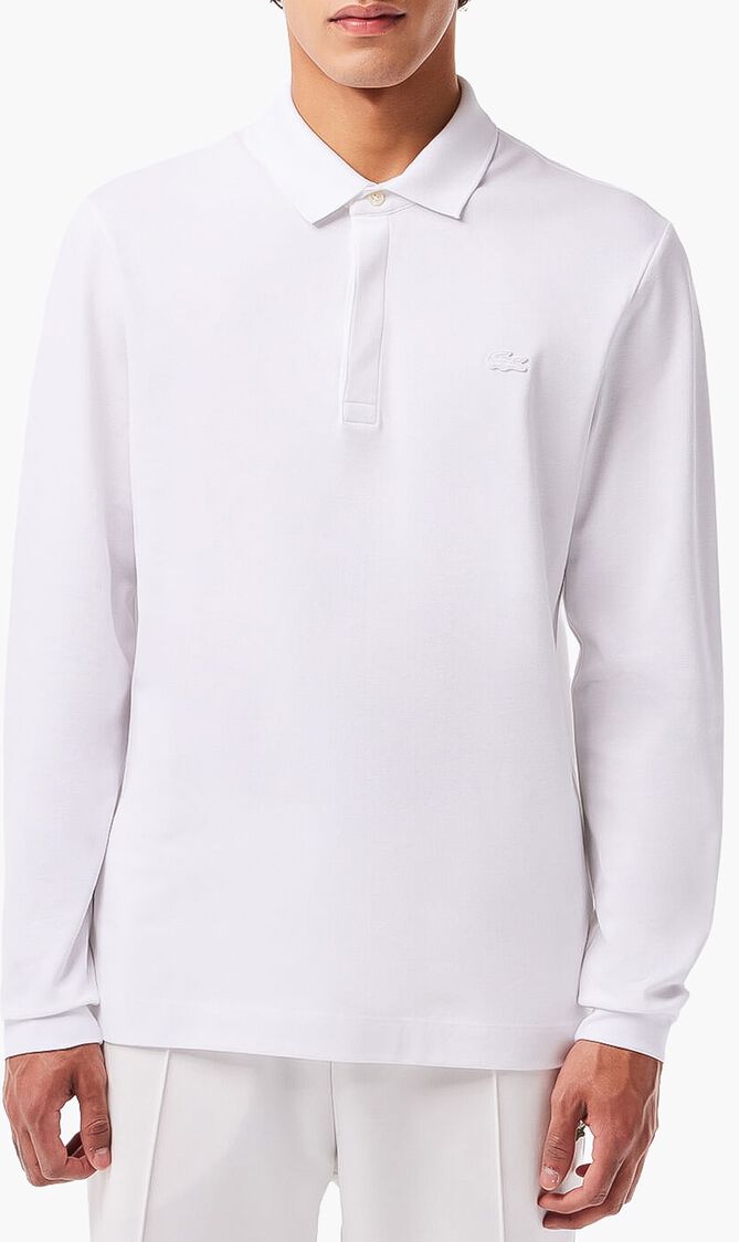 قميص بولو من نسيج مرن ذو قصة كلاسيكية وأكمام طويلة قميص بولو من نسيج مرن ذو قصة كلاسيكية وأكمام طويلة