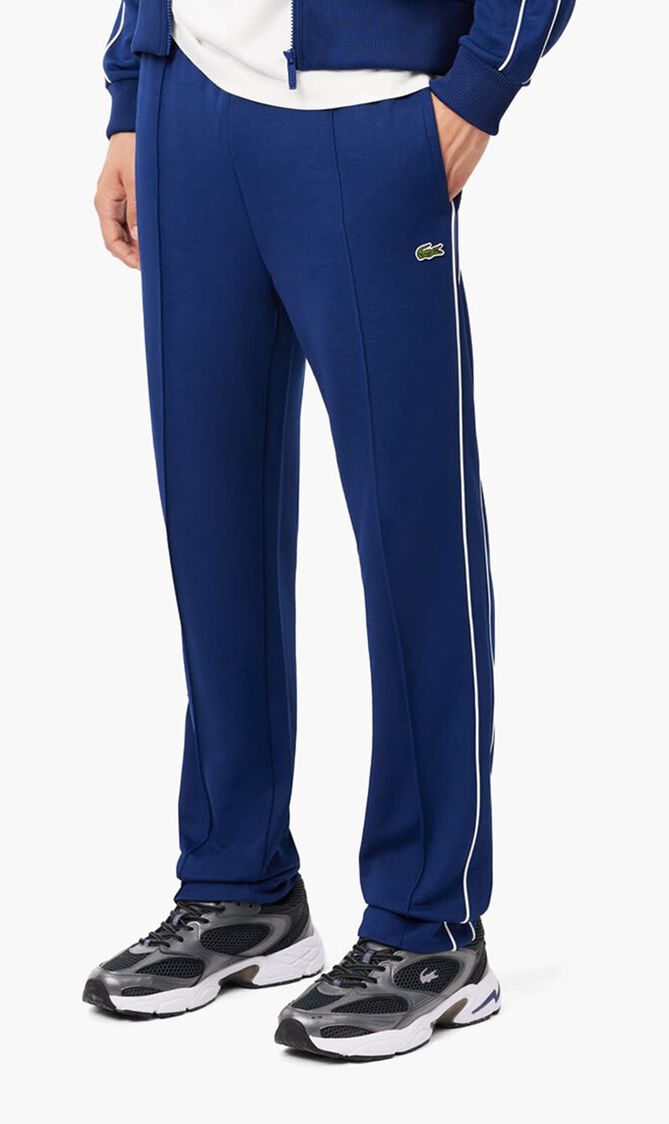 TRACKSUITS & TRACK TROUS.