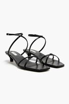 LEATHER CROSSOVER SANDALS