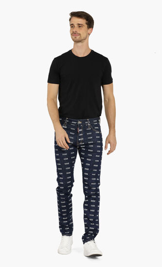 All Over Logo Print Jeans