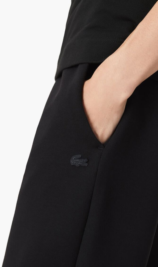 TRACKSUITS & TRACK TROUS.