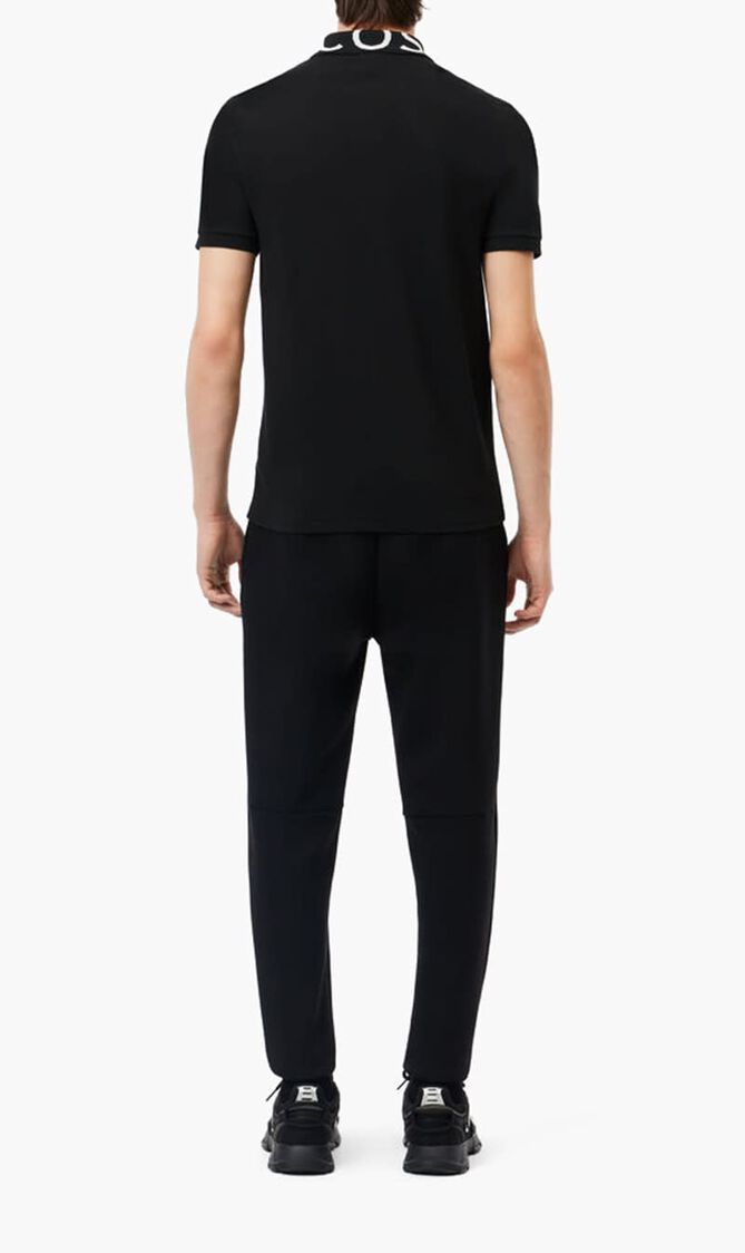 TRACKSUITS & TRACK TROUS.