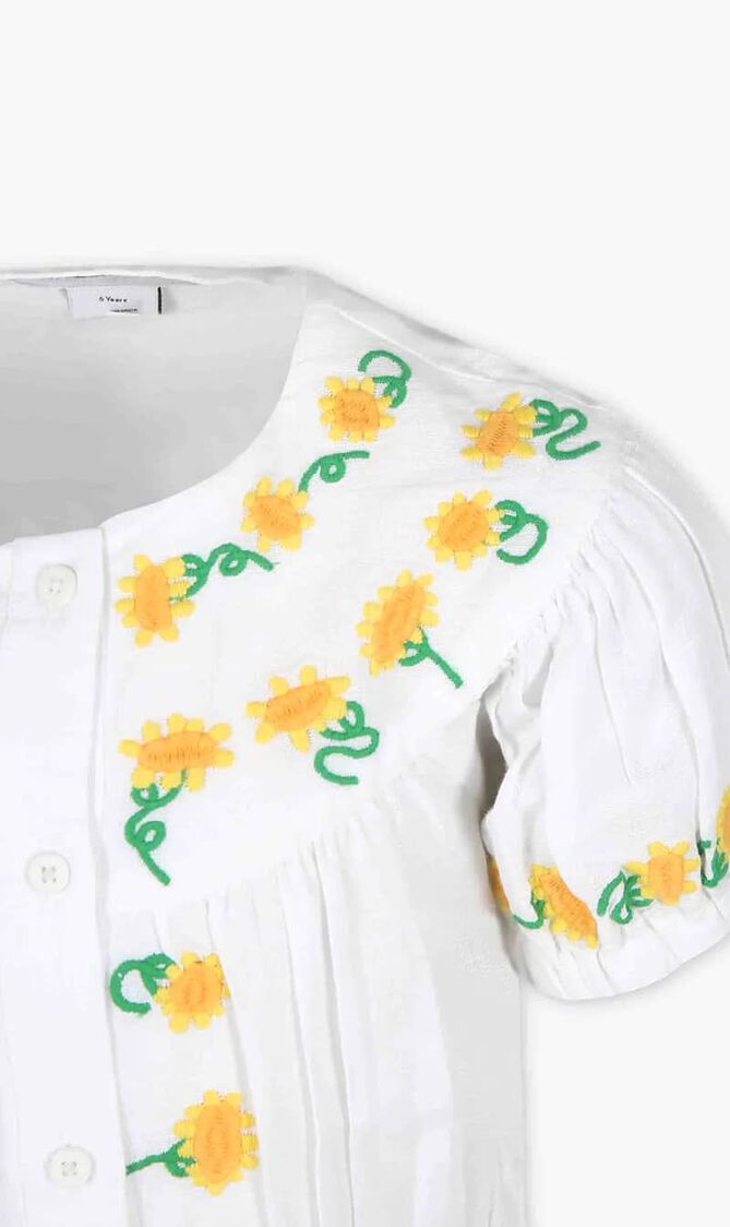 White dress for girl with embroidered sunflowers