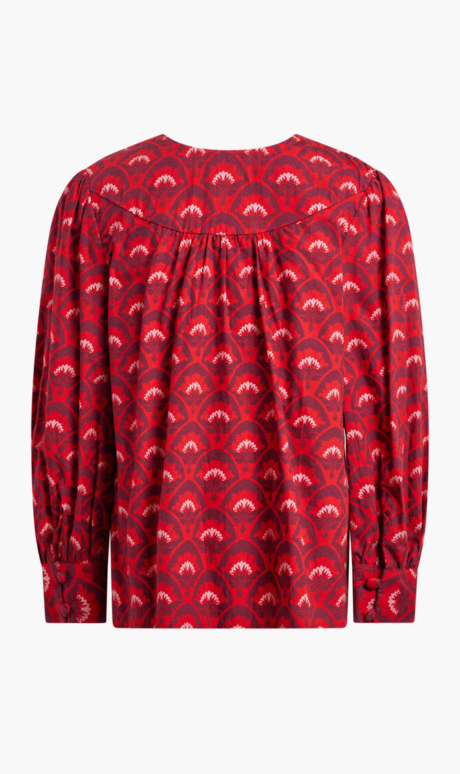 RED TOP WITH PURPLE AND PINK MOTIF AND LONG SLEEVES