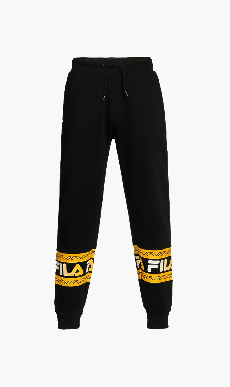 Yellow fila pants on sale