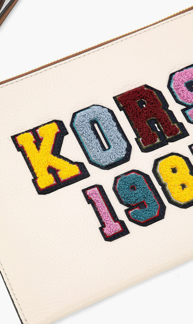 Jet Set Travel Wrist Clutch