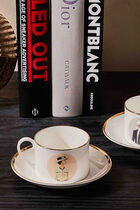 فنجان الشاي كوكو مع صحنه