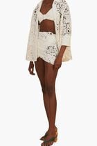 Sun Eyelet Wrap Mini Skirt