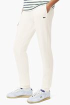 TRACKSUITS & TRACK TROUS.