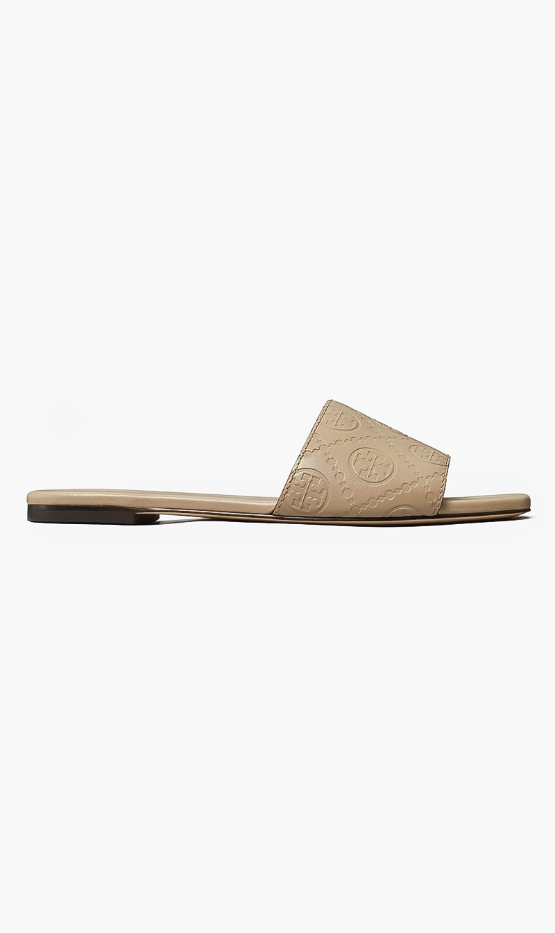 

Tory Burch Beige T Monogram Embossed Slide for Women | The Deal Outlet