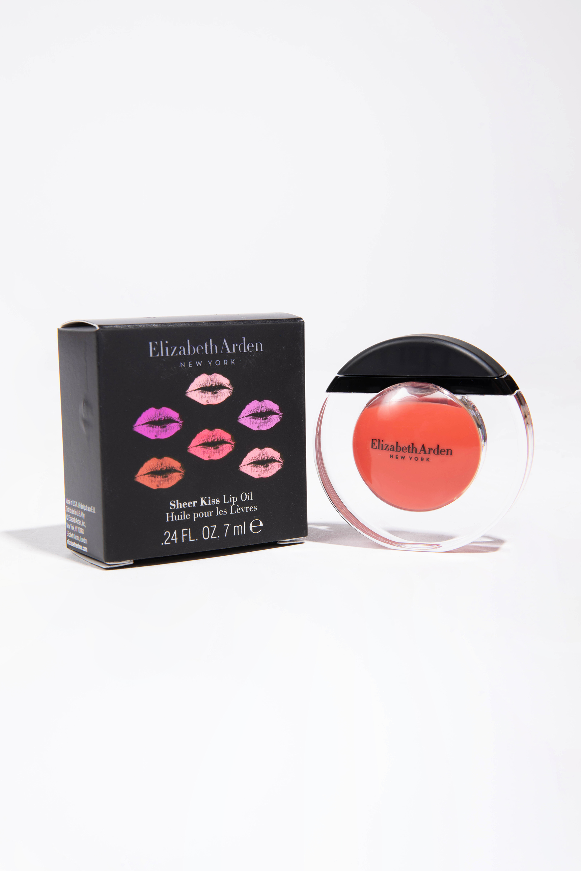 

Elizabeth Arden Sheer Kiss Lip Oil, Coral Caress 03
