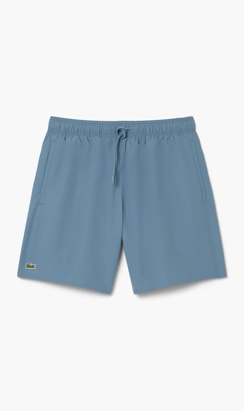 

Lacoste Blue Mid Length Monochrome Swim Trunks for Men | The Deal Outlet