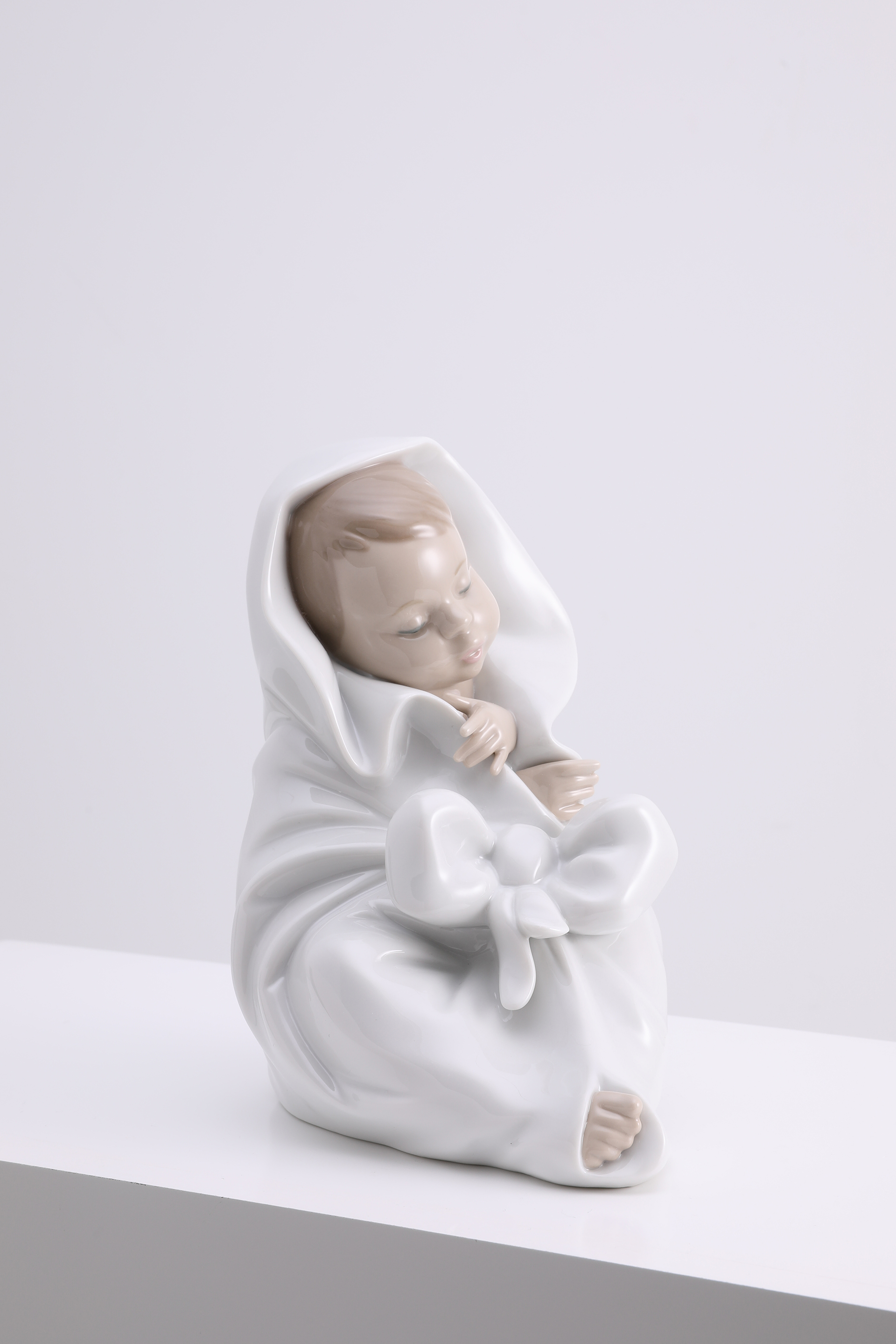 

Nao All Bundled Up Figurine