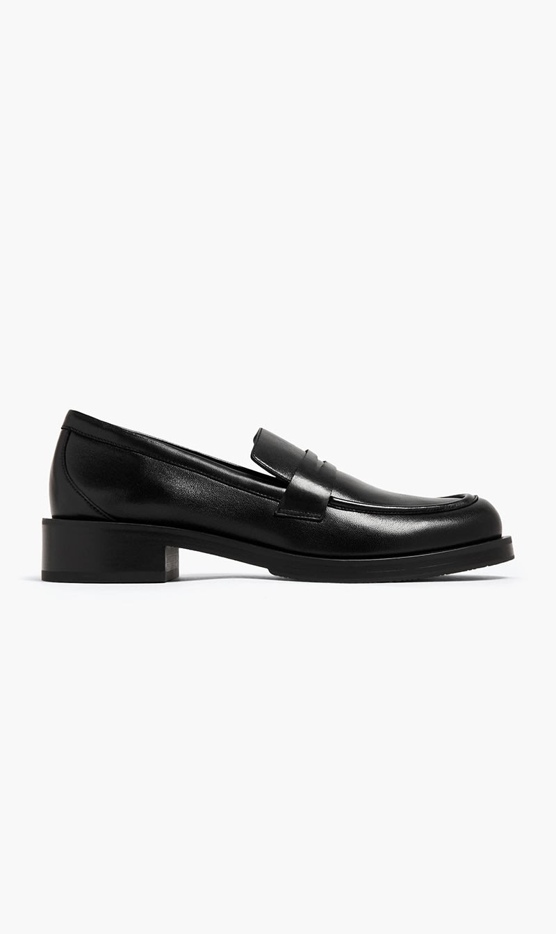 

Stuart Weitzman Black Palmer Bold Loafer for Women | The Deal Outlet