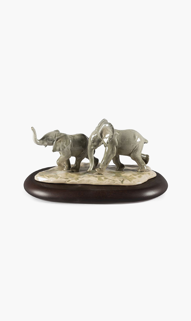 

Lladro Following The Path Elephants Sculpture